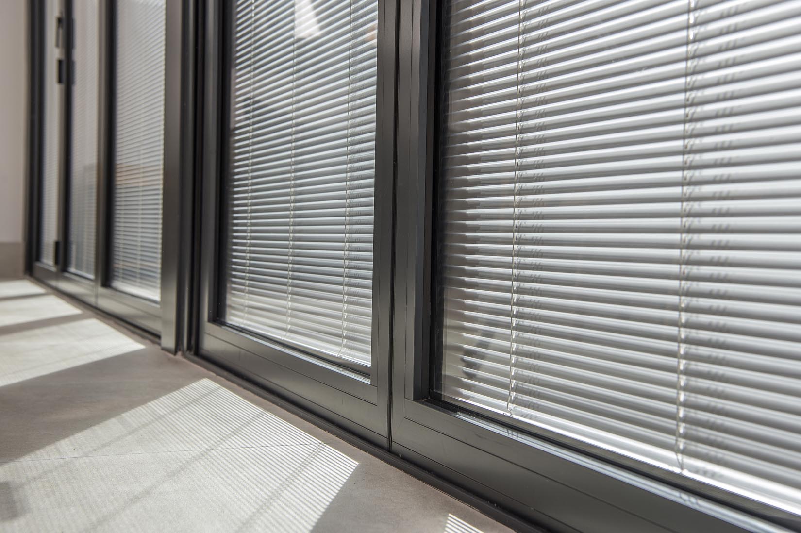 Integral blinds with solar control glass to reduce summer overheating and glare.